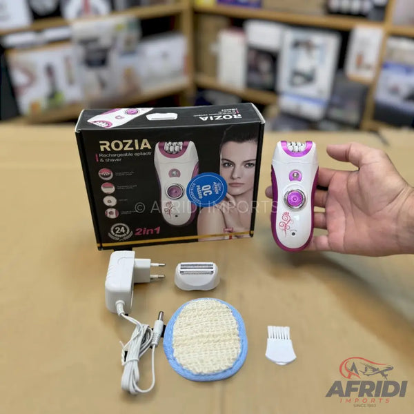 A white and purple rechargeable epilator and shaver set.