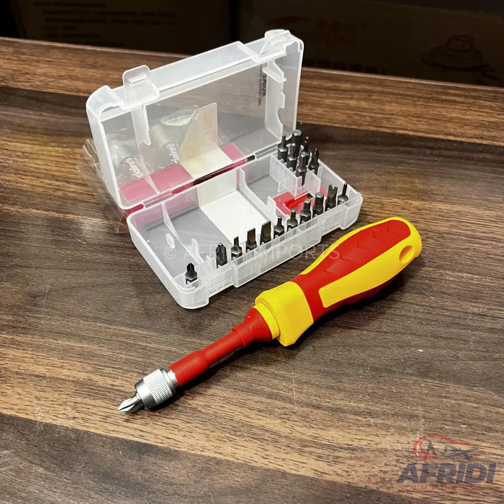 A screwdriver with a red and yellow handle, featuring a removable bit and accompanied by a clear plastic case containing a variety of interchangeable bits.
