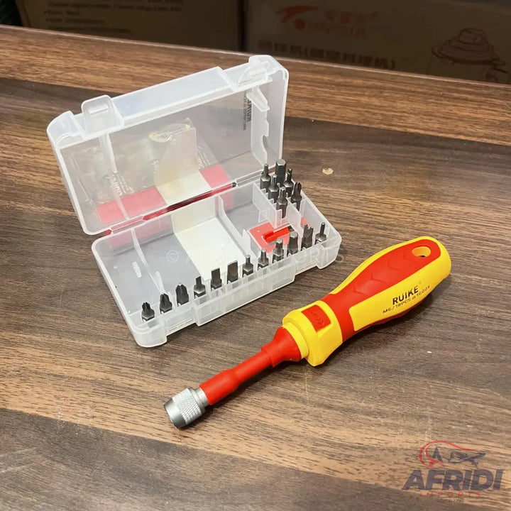 A screwdriver set with interchangeable bits in a clear plastic case.