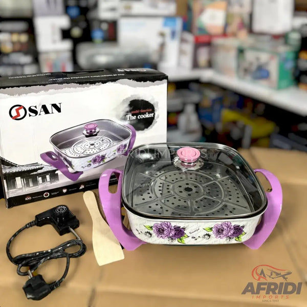 Purple floral electric multi-cooker with a glass lid and steamer insert.
