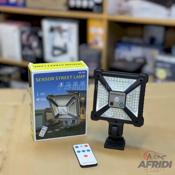 A solar-powered sensor street lamp with a remote control.