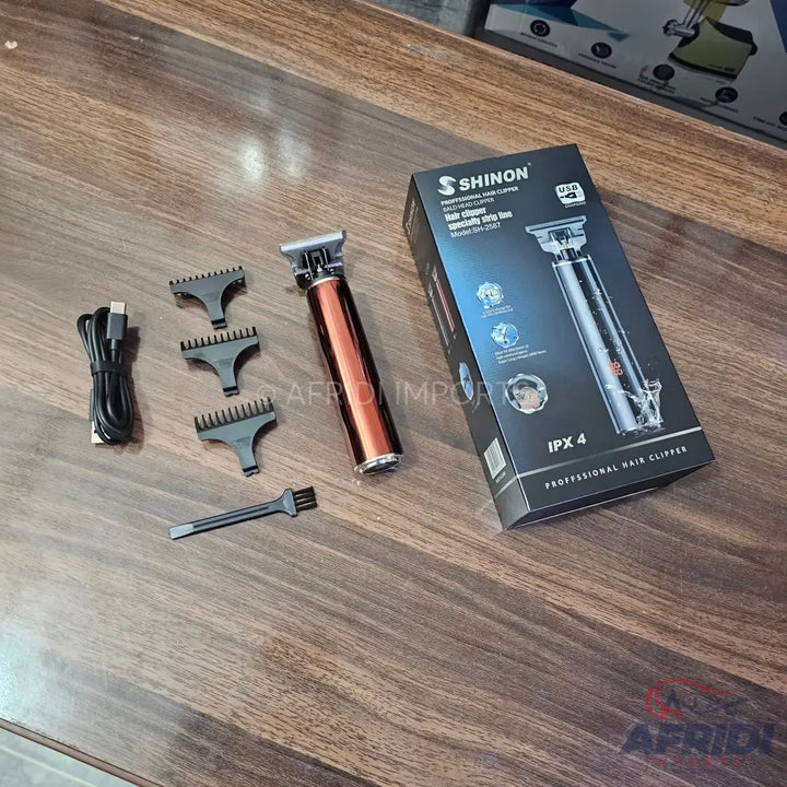 A cordless hair clipper with multiple guide combs and a charging cable.
