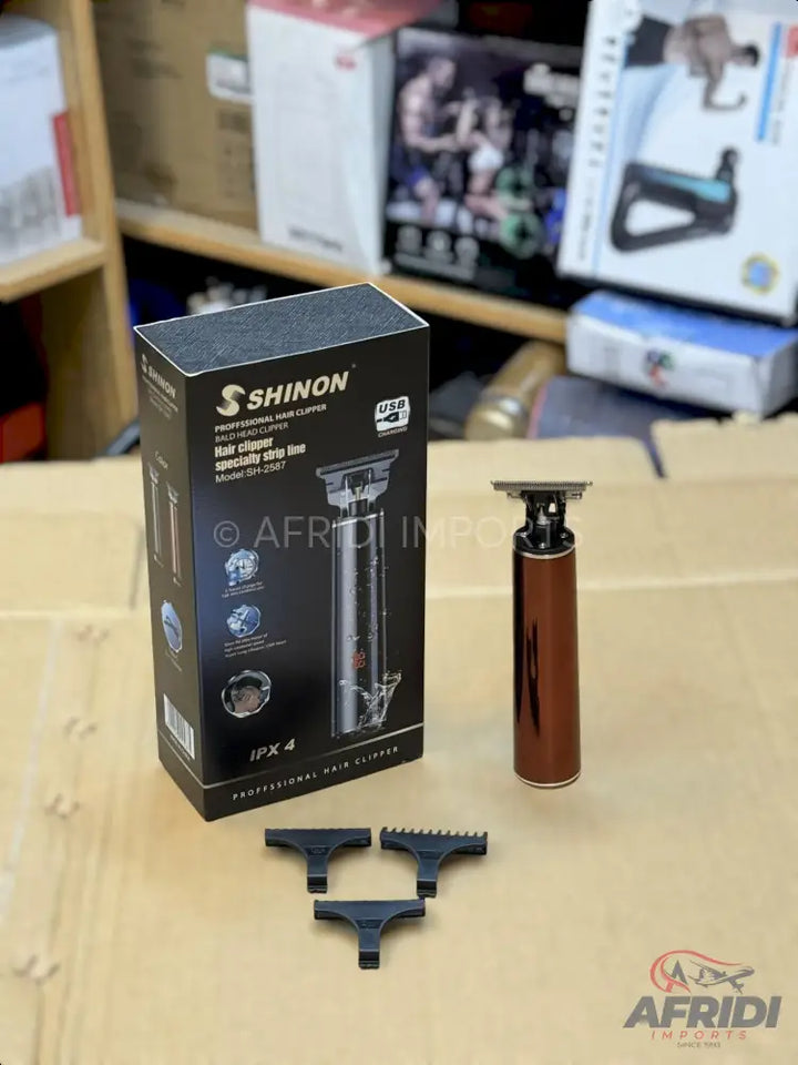 A professional hair clipper and trimmer set with multiple comb attachments.
