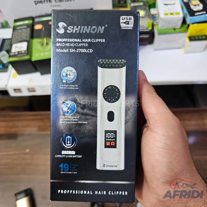 A Shinon professional hair clipper with an LCD display, 800mAh battery, and USB charging.