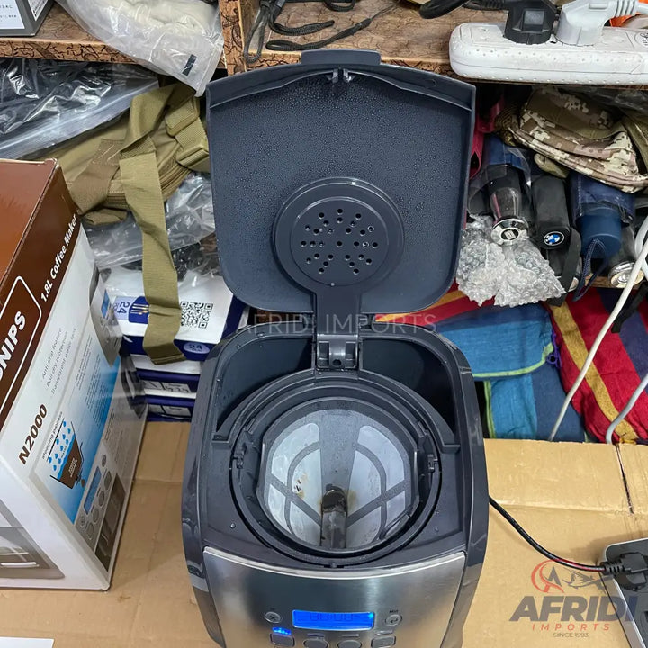 An open coffee maker with a reusable filter.