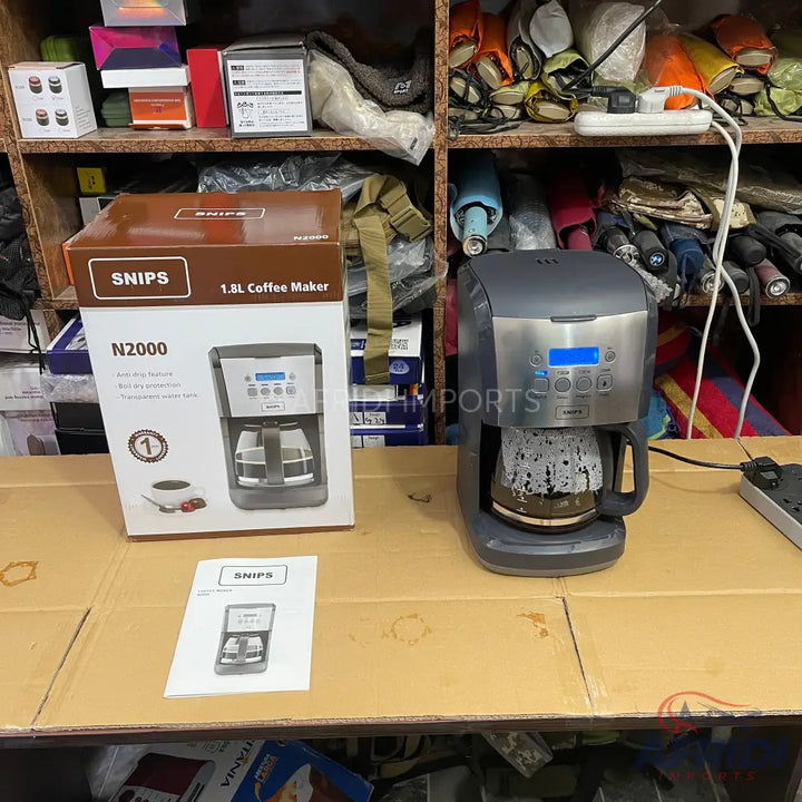 New 1.8L coffee maker with digital controls.