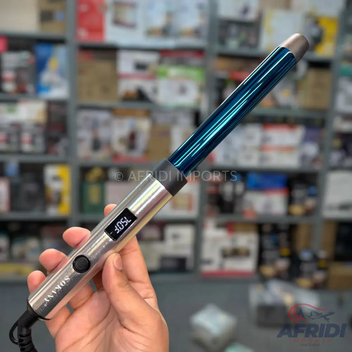 Blue-barreled curling iron with a digital temperature display.