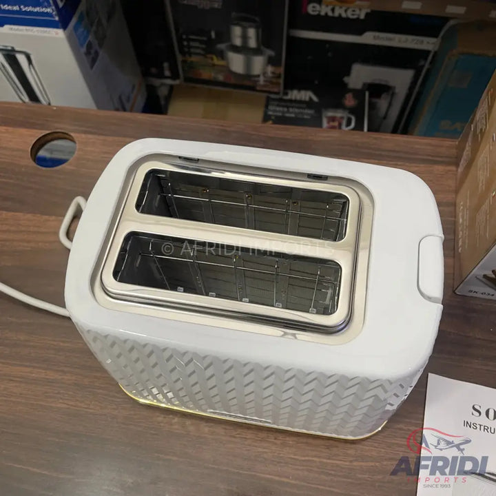 A white two-slice toaster with a textured exterior.