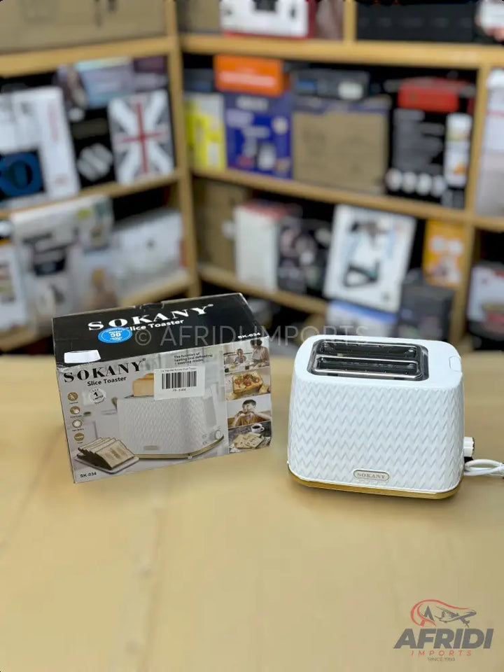 A white, two-slice toaster with a textured design.