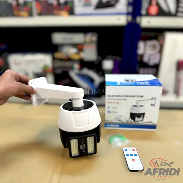 White and black solar simulation monitoring camera with remote control.