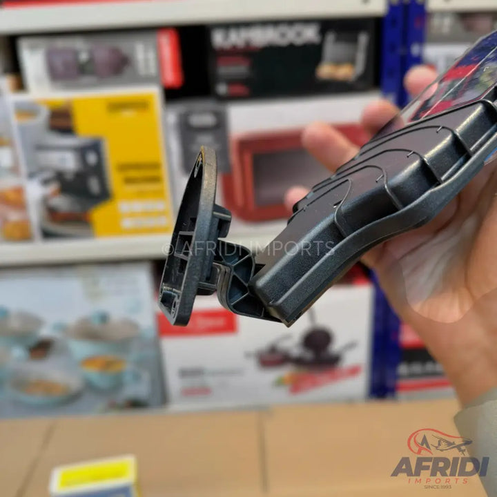 Black plastic rearview mirror for a vehicle.