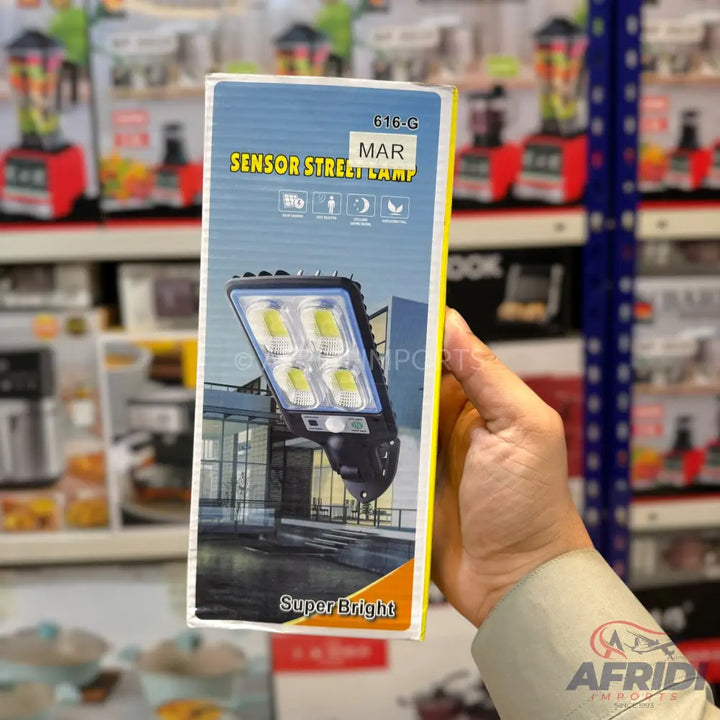 A boxed sensor street lamp with four bright LED lights.