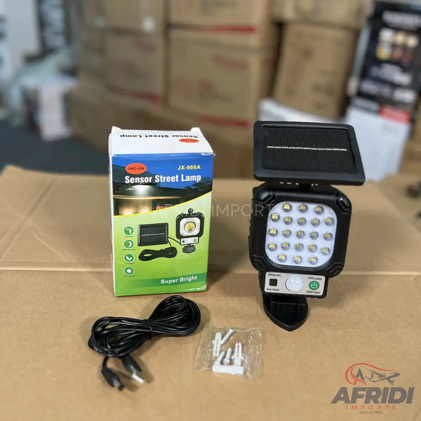 A solar-powered sensor street lamp with an external solar panel, LED light, and motion sensor.