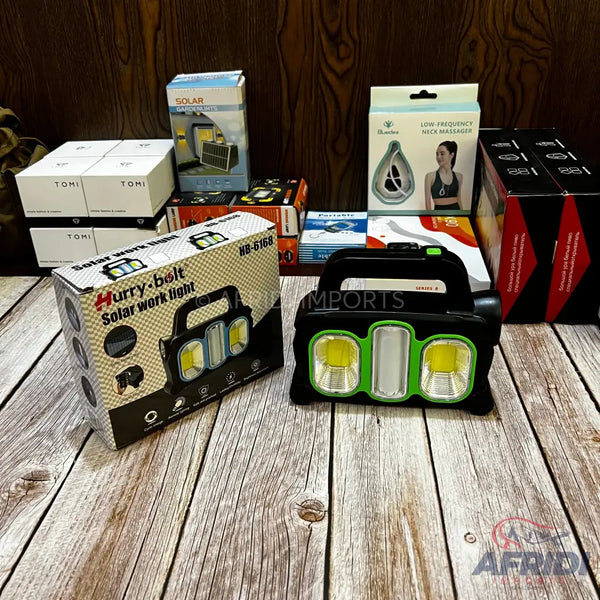 Portable solar work light with three LED panels, two yellow and one white.