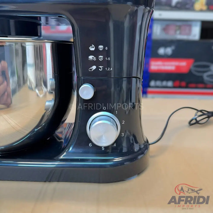 Black stand mixer with a stainless steel bowl and speed settings.