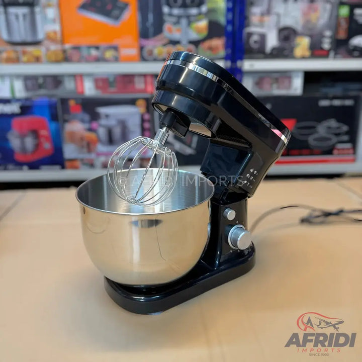 Black stand mixer with a stainless steel bowl and whisk attachment.
