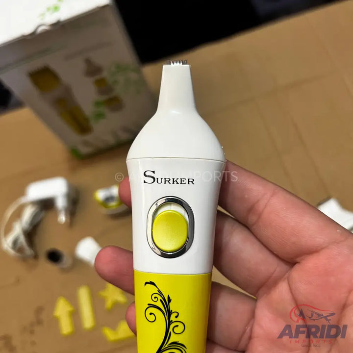 White and yellow electric nose and ear hair trimmer with a single power button.