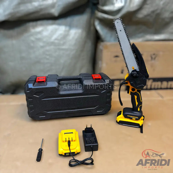 Cordless mini chainsaw with battery, charger, and carrying case.