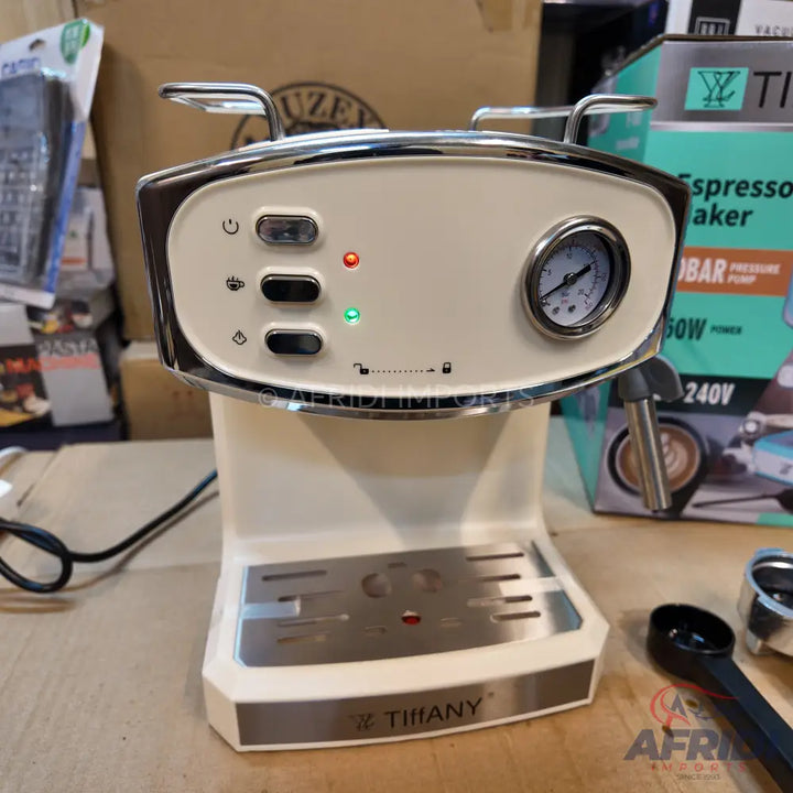 Cream-colored espresso maker with a pressure gauge.