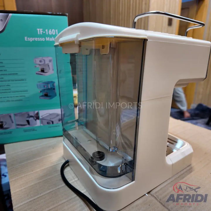 White espresso maker with a clear water tank.