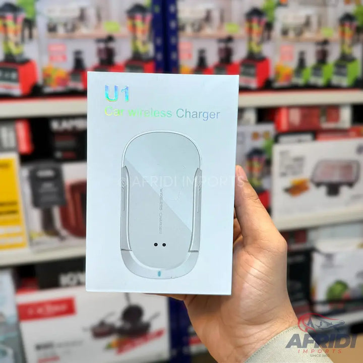 A white wireless phone charger with an automatic clamping mechanism.
