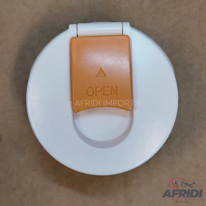 White circular container with an orange hinged ’OPEN’ lid.