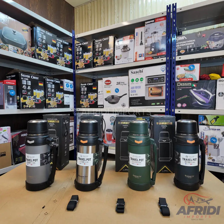 A selection of insulated travel pots with handles and shoulder straps.