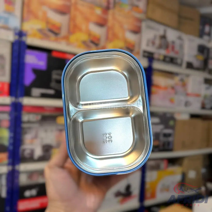 Metal bento box with two compartments.