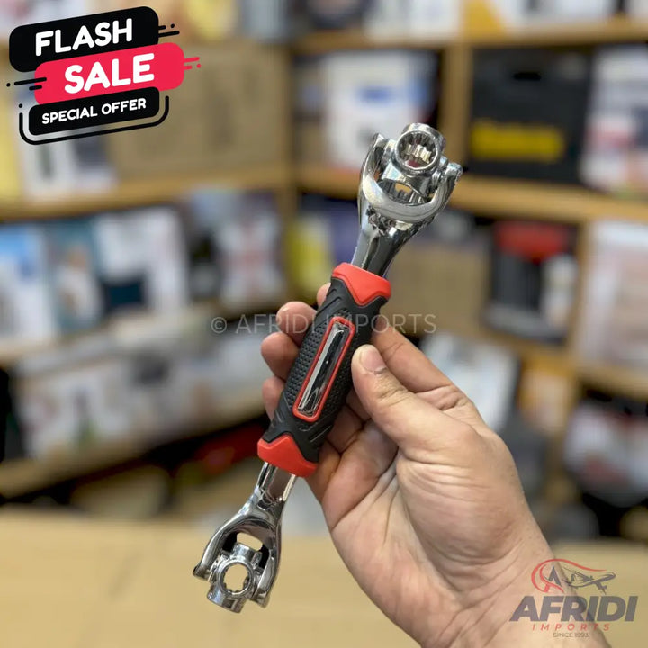 A multi-functional universal socket wrench with a black and red ergonomic grip.
