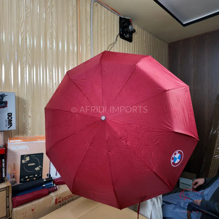 Red umbrella with BMW logo