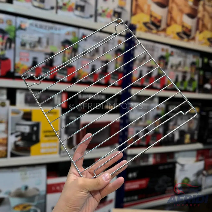 Silver-colored metal oven rack.