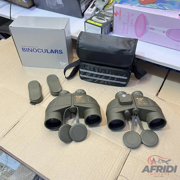 Two sets of olive green binoculars with lens caps and a carrying bag.