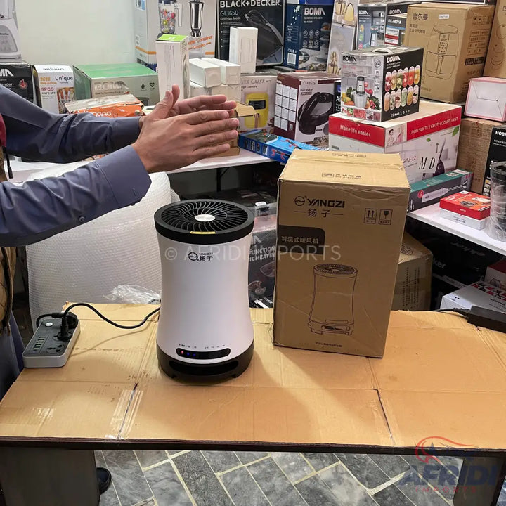 White and black cylindrical air purifier with a top fan and control panel.