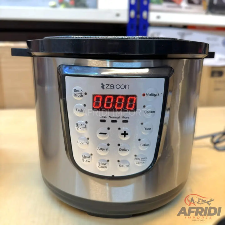 Stainless steel digital multi-cooker with various preset cooking functions.