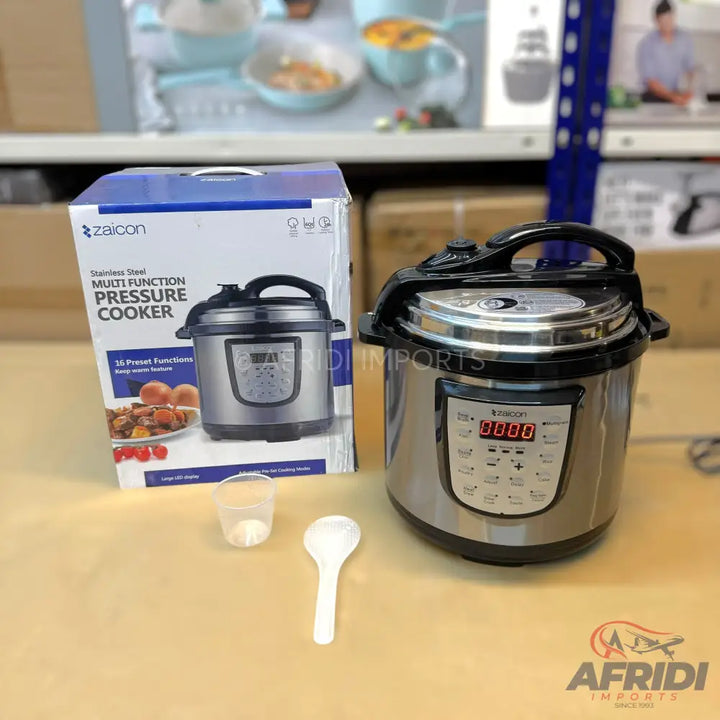 Stainless steel multi-function pressure cooker with digital display and control panel.