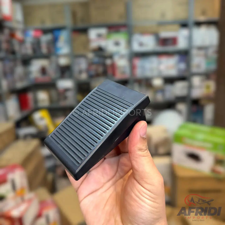 Black ribbed foot pedal.