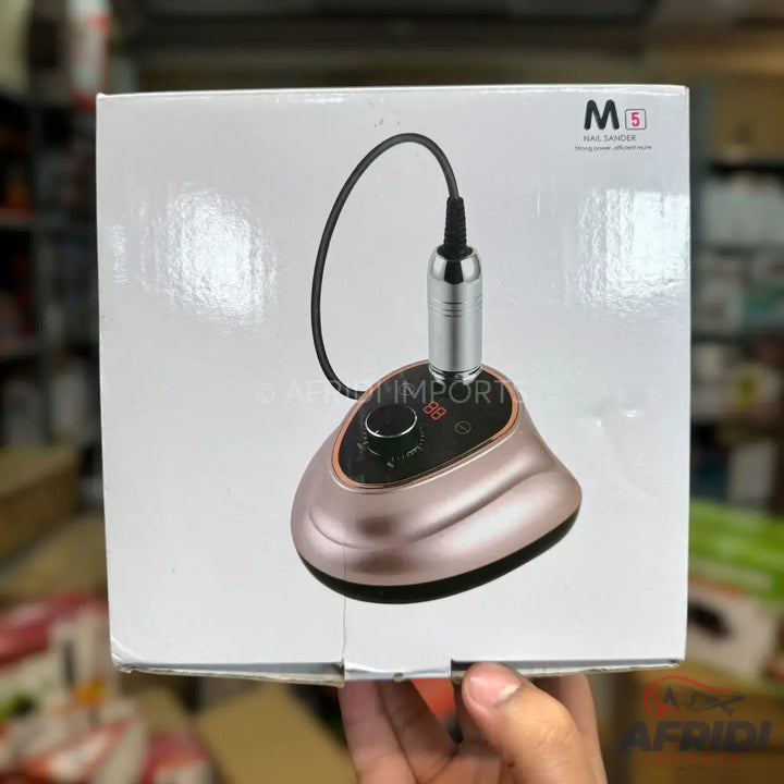 A rose gold and black electric nail grinder with a silver handpiece.
