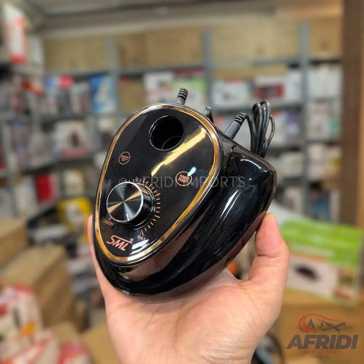 Black and gold electric nail drill machine with speed control dial.