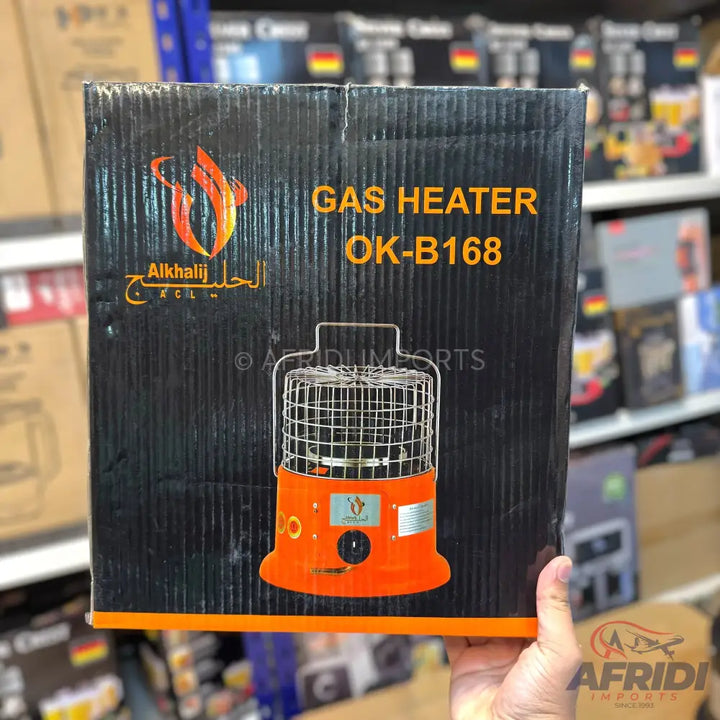 An orange gas heater with a protective metal grill.