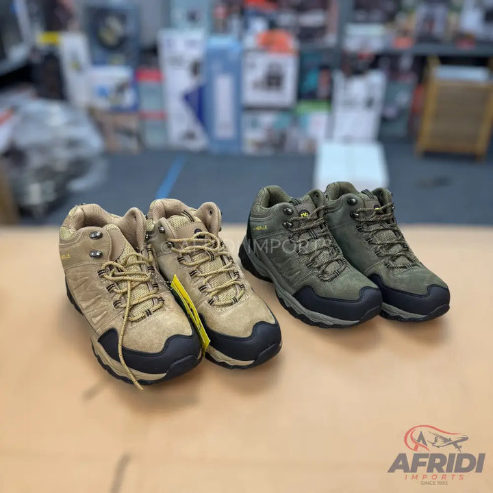 Two pairs of men’s hiking boots in tan and olive green.