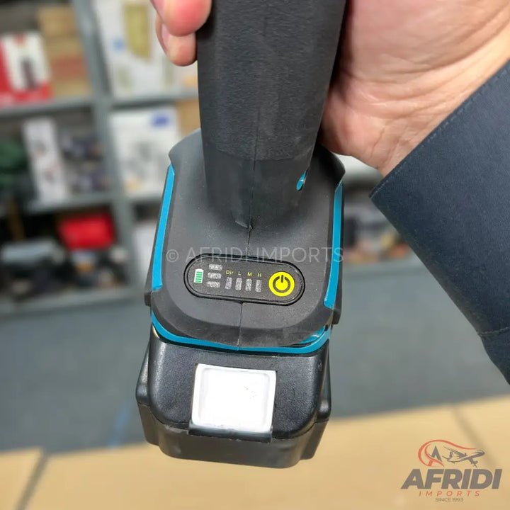 A cordless power tool with a battery indicator and power button.