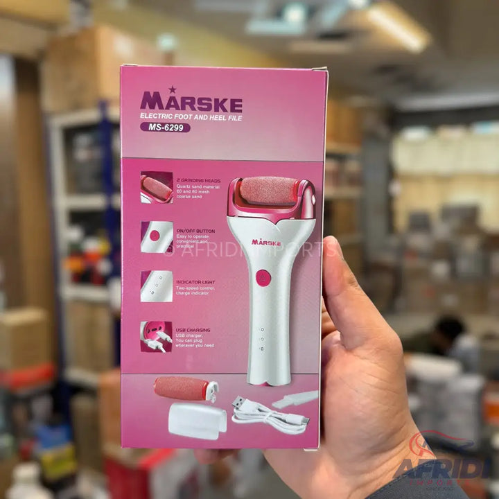 A pink and white electric foot and nail file with interchangeable heads and USB charging.