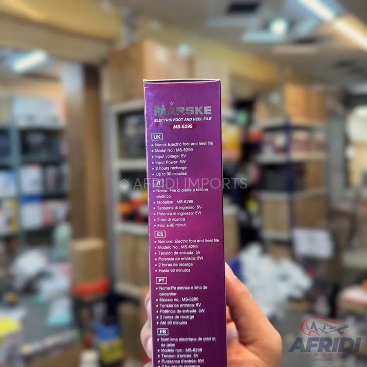 Purple box for a ’Mårskë Electric Foot and Heel File’ with specifications in multiple languages.