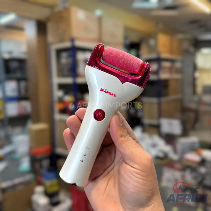 A white and pink electric foot file with a textured roller, a power button, and three indicator lights.