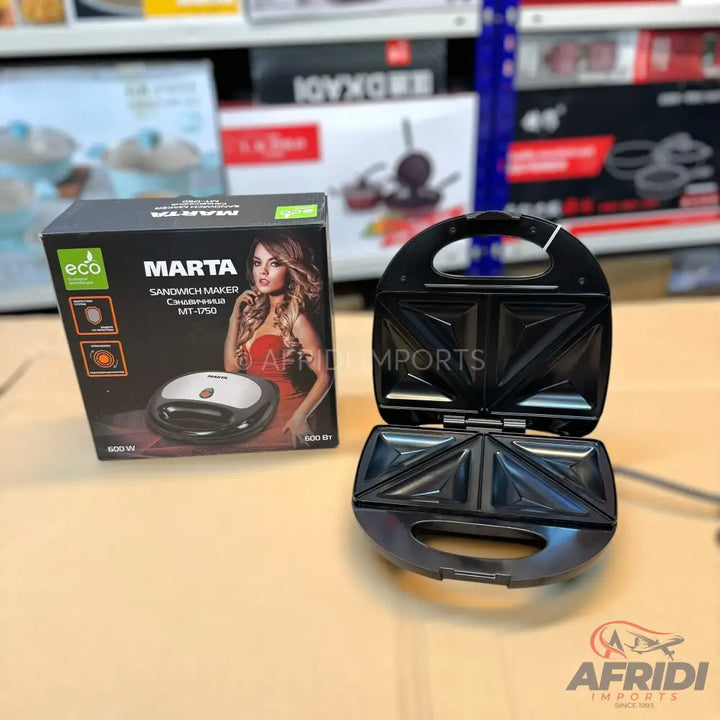 Black sandwich maker with non-stick triangular plates.