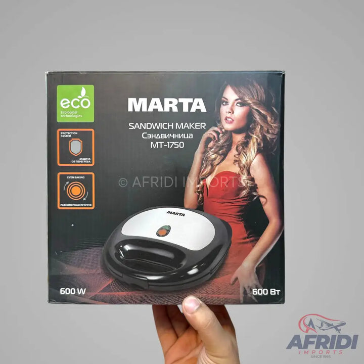 A black and white sandwich maker with a 600W power rating.