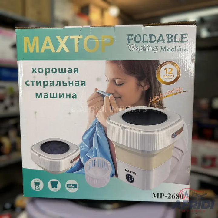 Box for a foldable washing machine, featuring a woman smelling a clean garment.