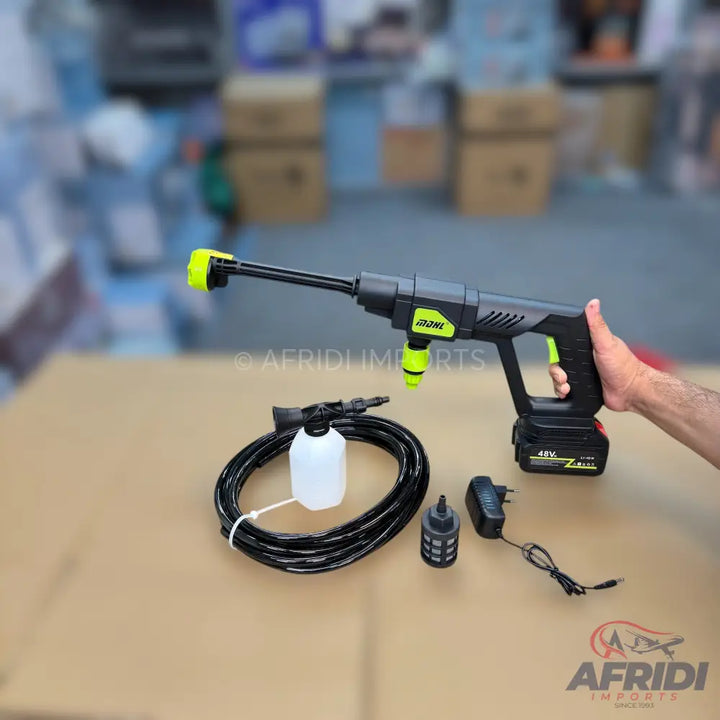 Cordless portable pressure washer with accessories.