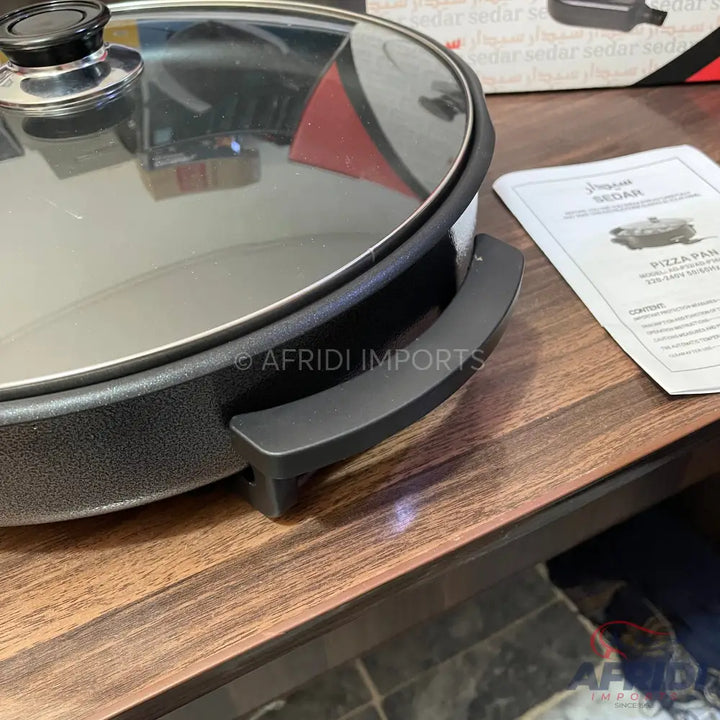 Electric pizza pan with glass lid
