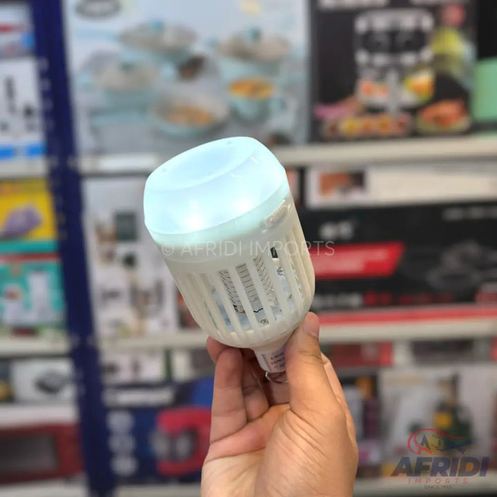A white, illuminated LED bulb with a pale blue top.